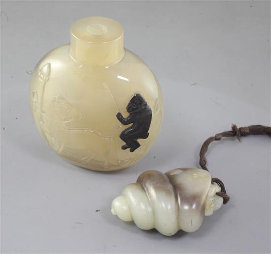A Chinese pale celadon and brown jade carving and a shadow agate snuff bottle, late 19th/early 20th century, height 6.7cm